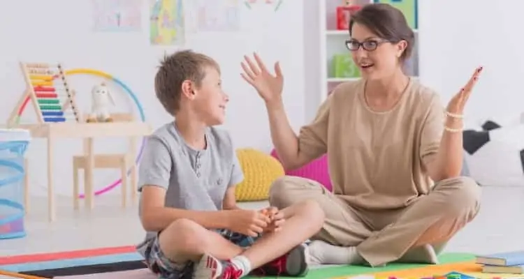 a babysitter playing with child