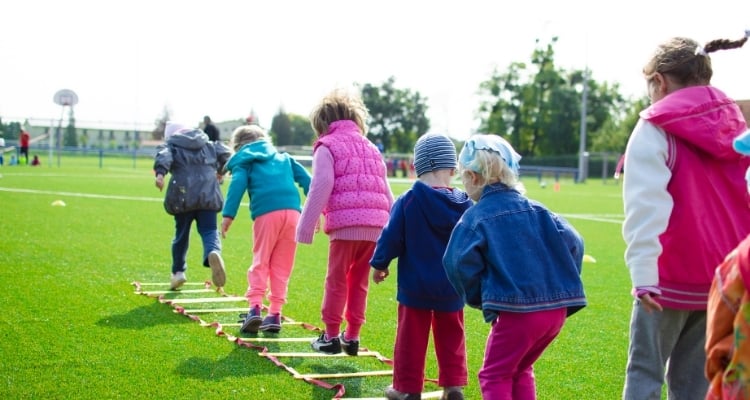 young kids playing outside