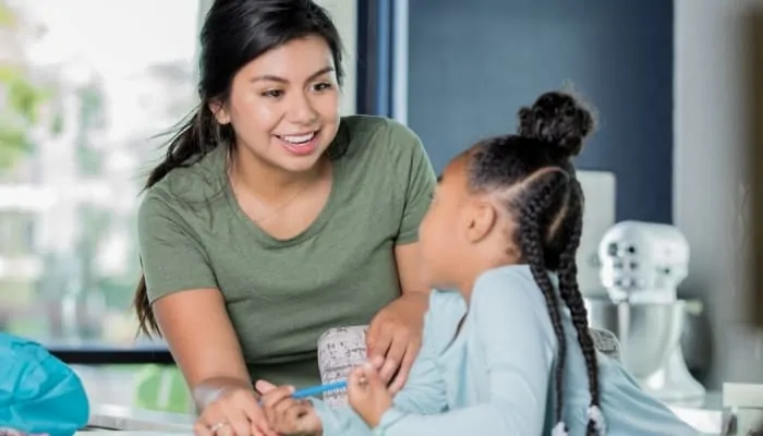 babysitter tutoring child