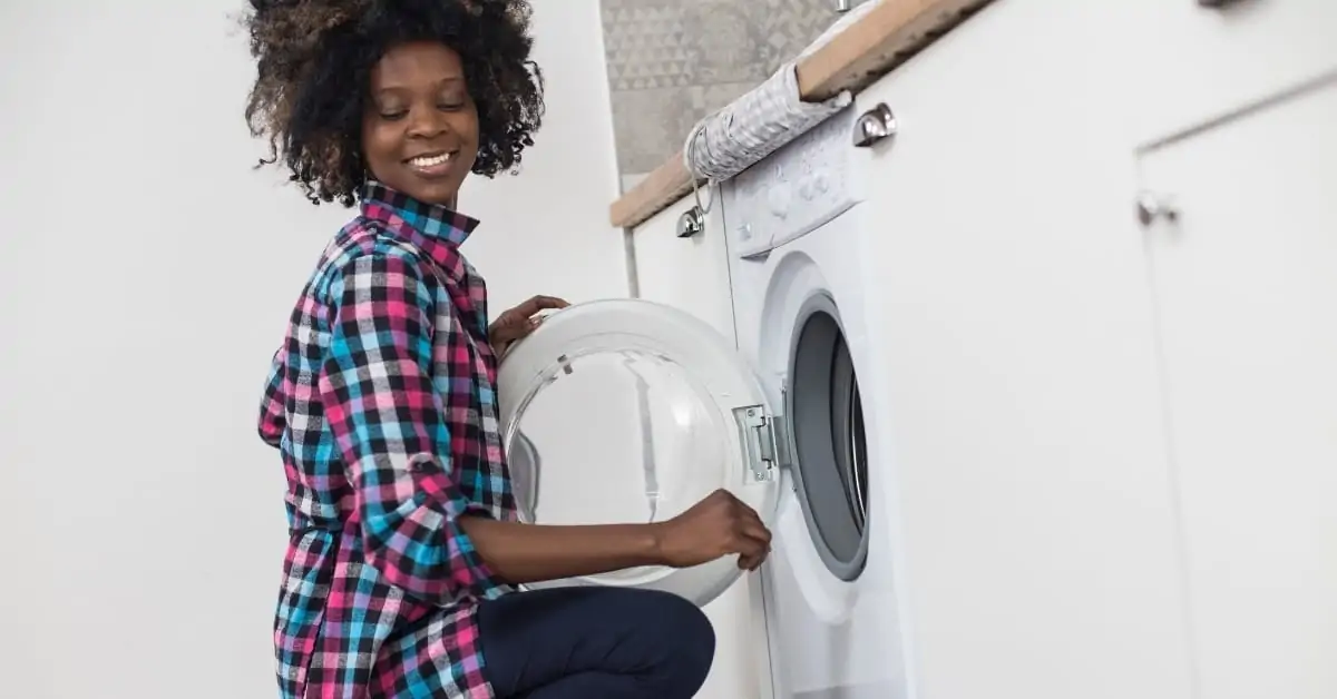 childcare provider doing laundry