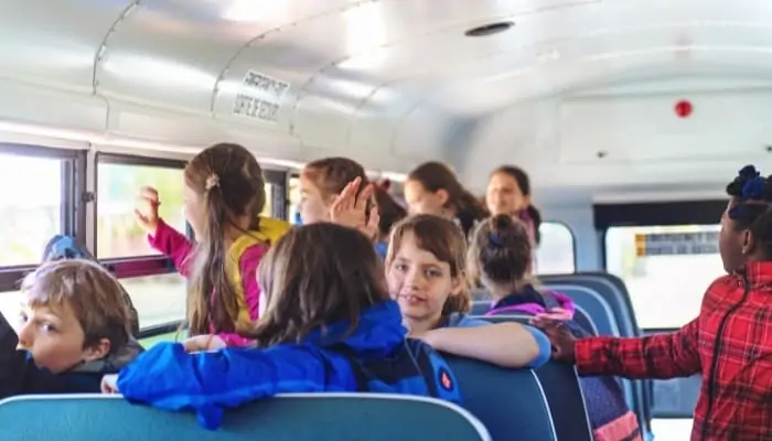 young children on a school bus