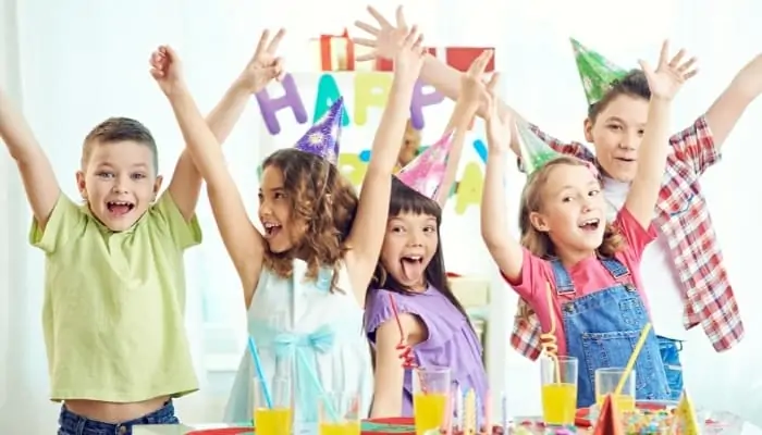 kids at birthday party celebrating