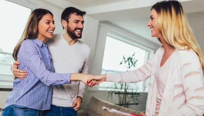 a realtor talking to a married couple