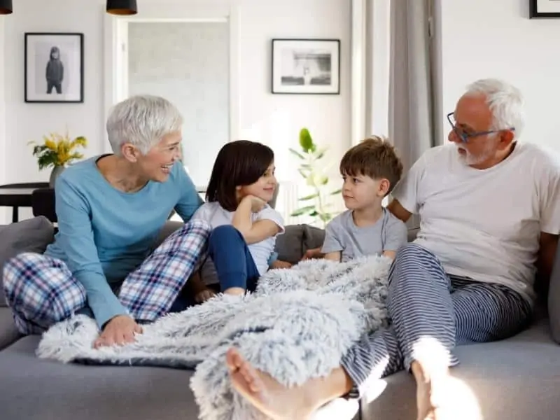 grandfather and grandmother with grandchildren