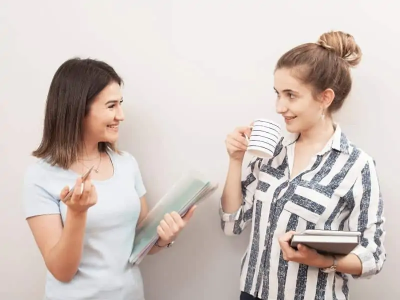 two woman talking