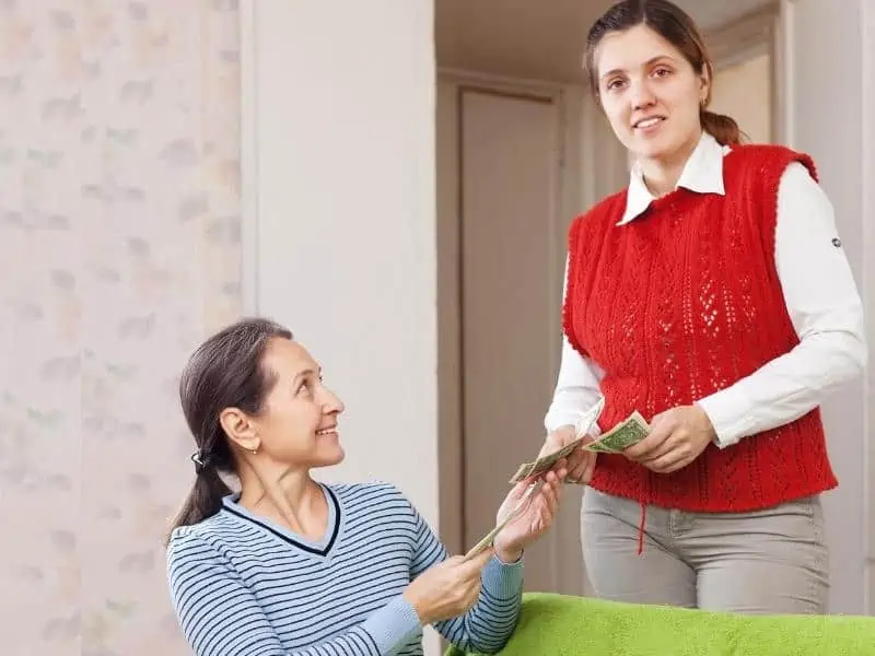 daughter gives mother the money