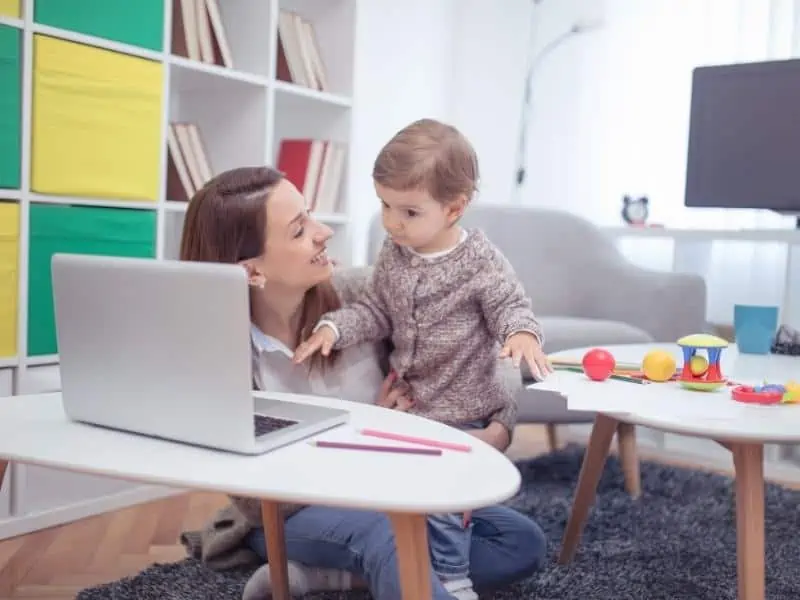 nanny and baby indoors