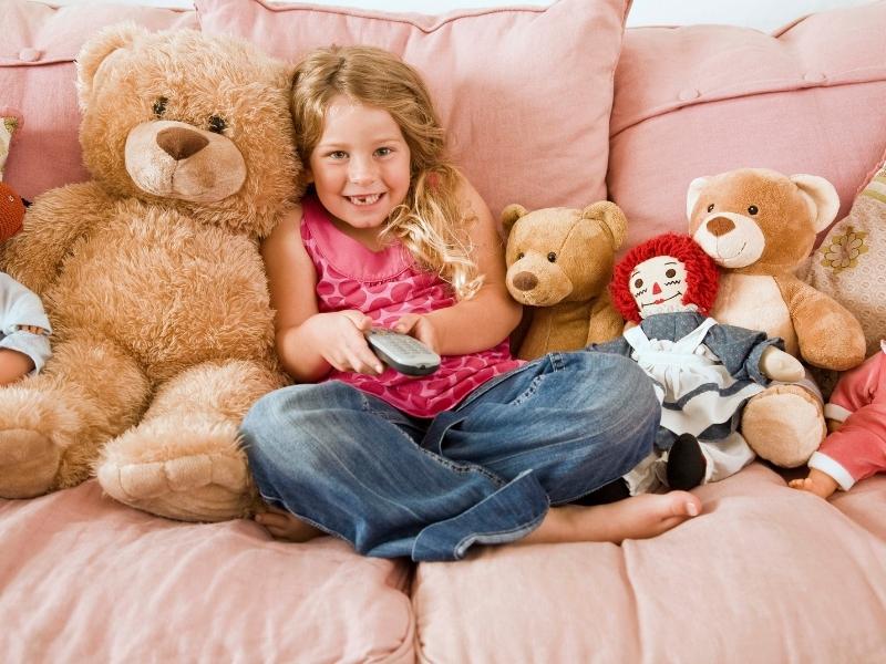 7 year old boy playing on sale with stuffed animals