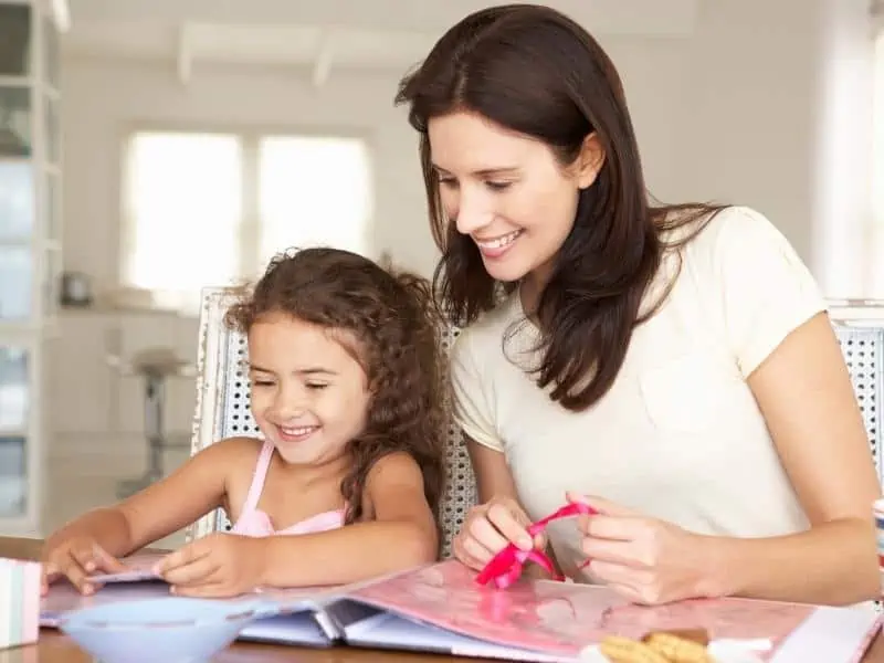 mom teaching daughter