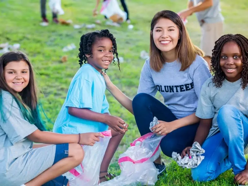 young one cleaning the community