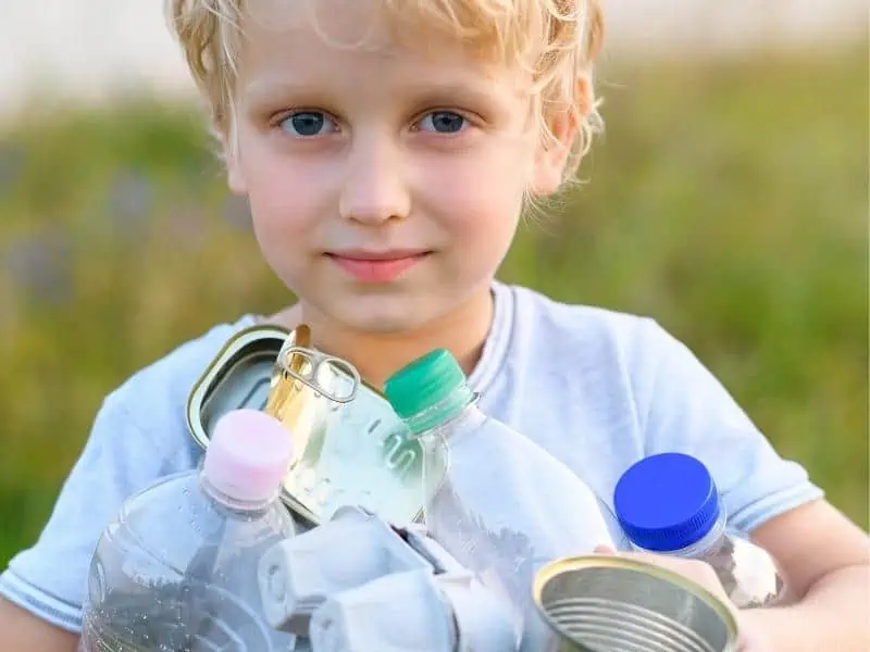 kid holding items