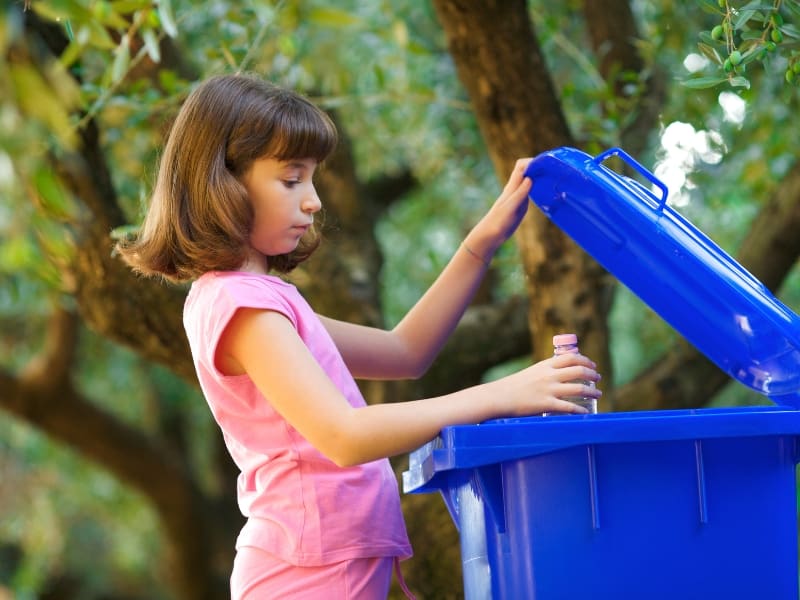 girl throwing garbage