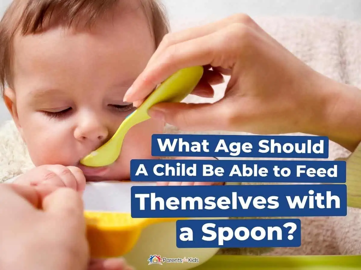 When should a baby feed themselves with store a spoon