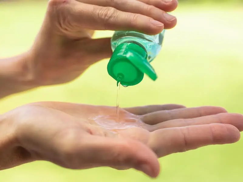 washing hands with alcohol