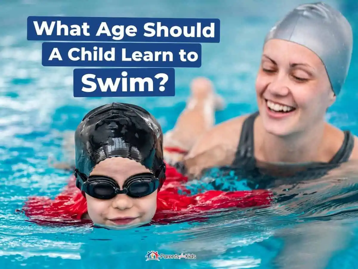 parent teaching kid to swim